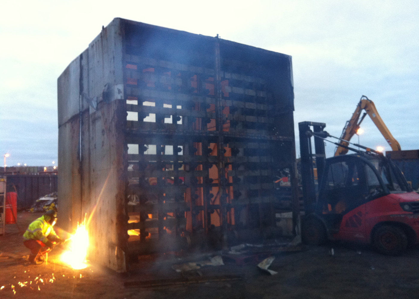 Operative hot cutting a large steel structure in the decommissioning bay