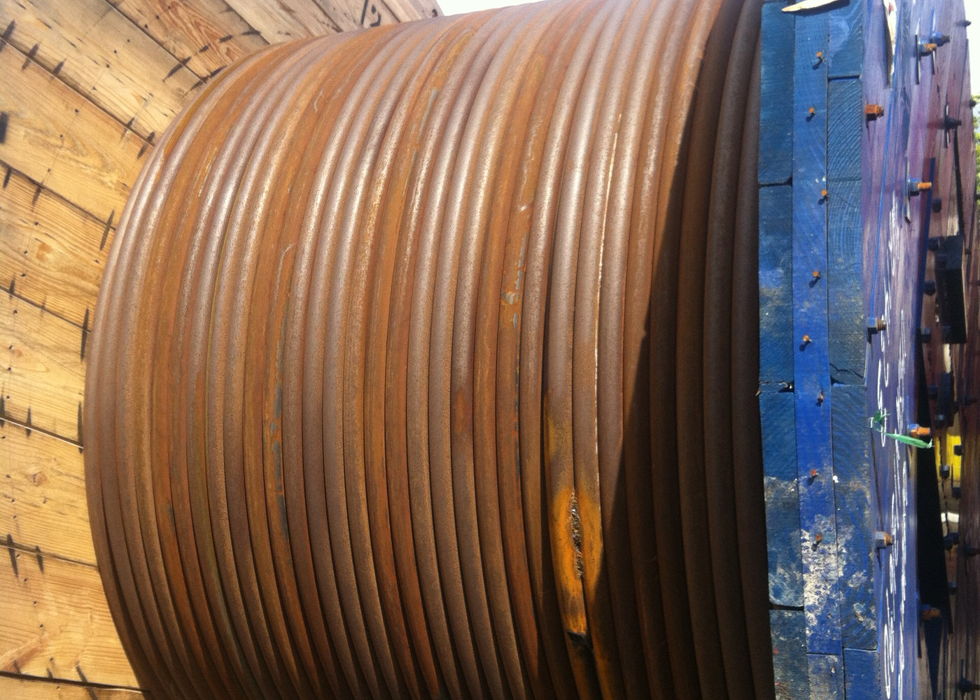 Steel umbilical reel wound with subsea line awaiting flushing